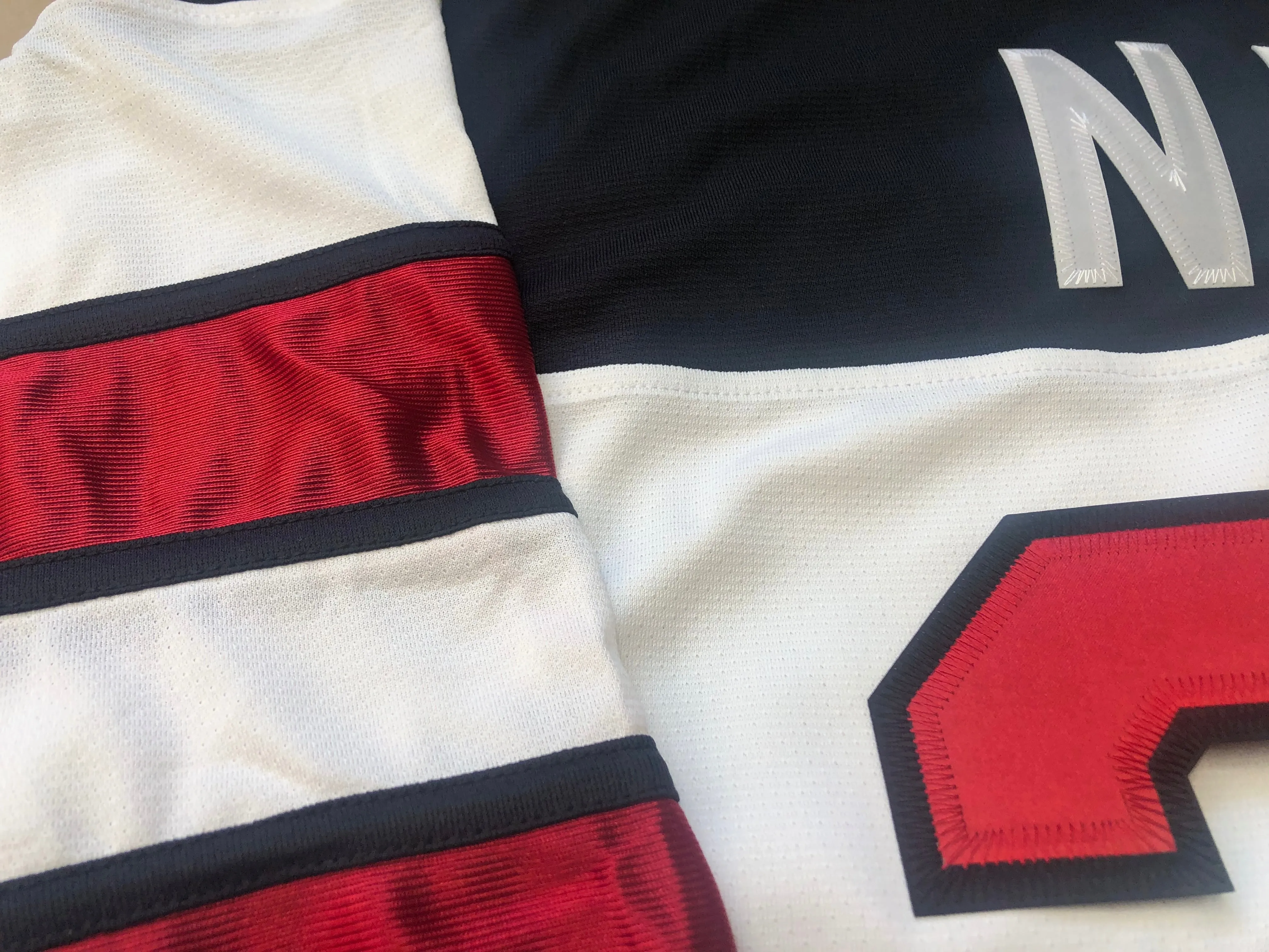 Custom Hockey Jerseys with a Van Halen Embroidered Twill Logo